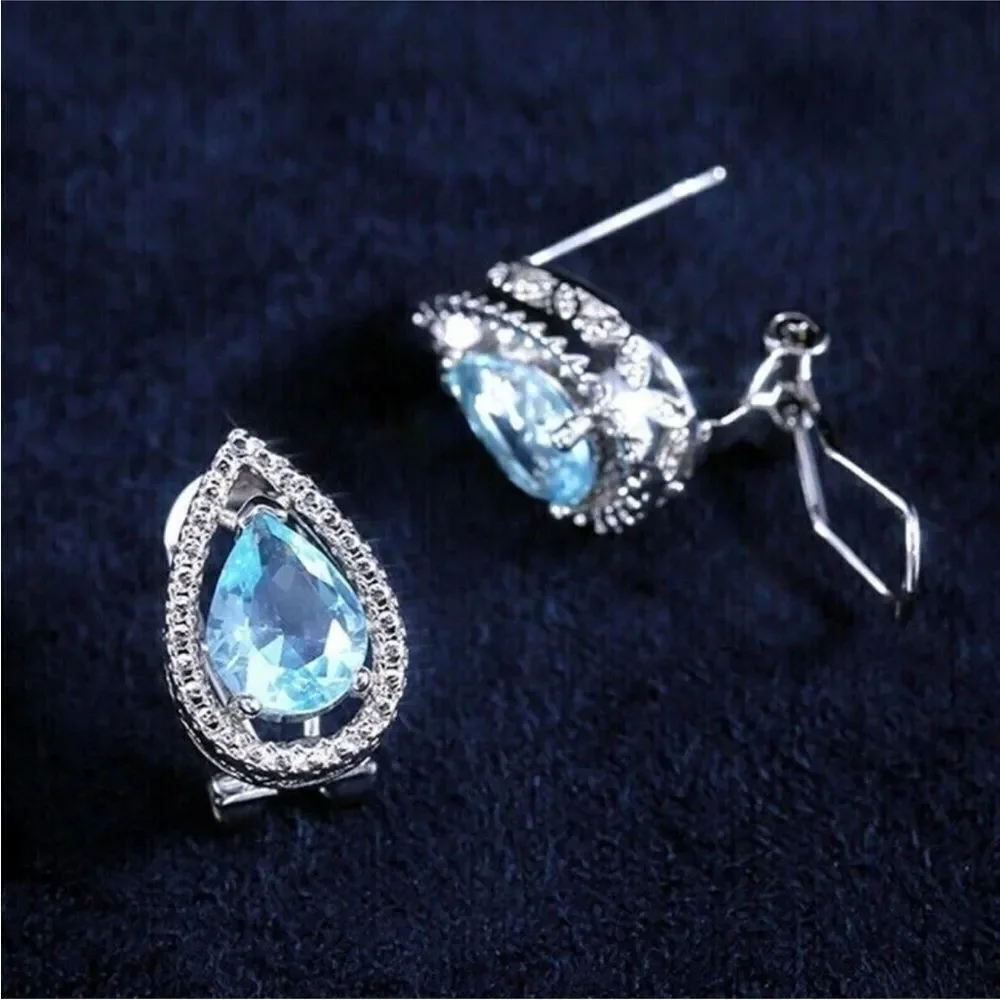Blue Topaz Tear Drop hinge closure silver earrings